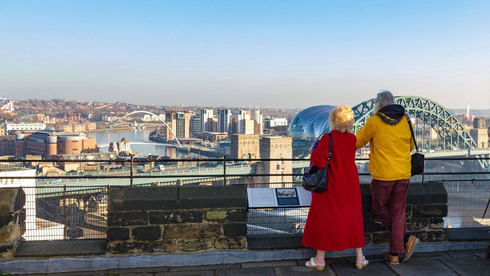 A couple looking out over Glasgow